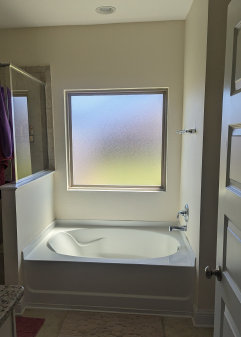 Master Bath before stained glass window